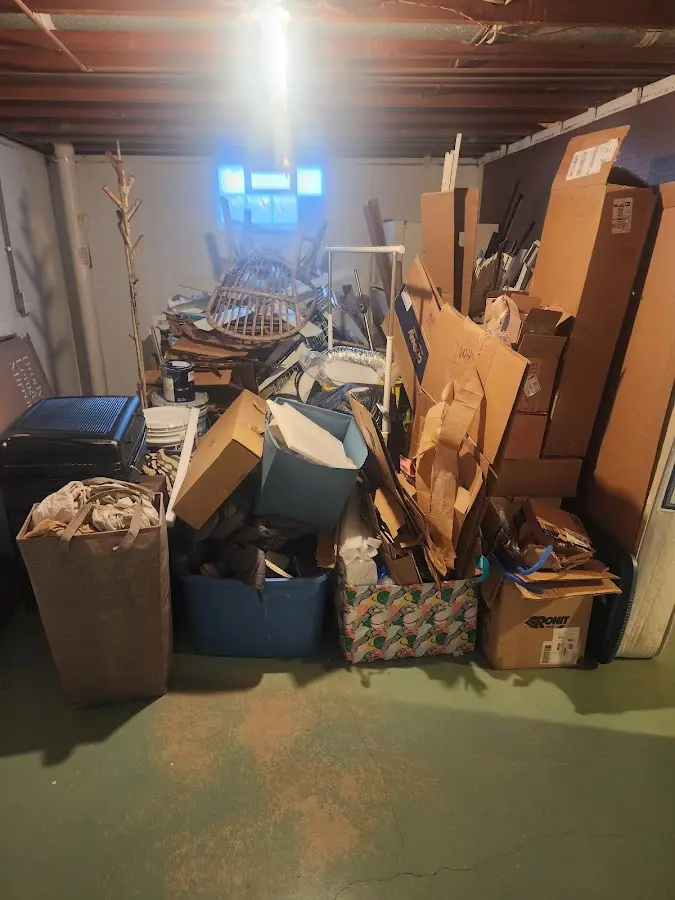 Roll-off dumpster container at job site for 2 Yard Dumpster Rental in Harper Woods